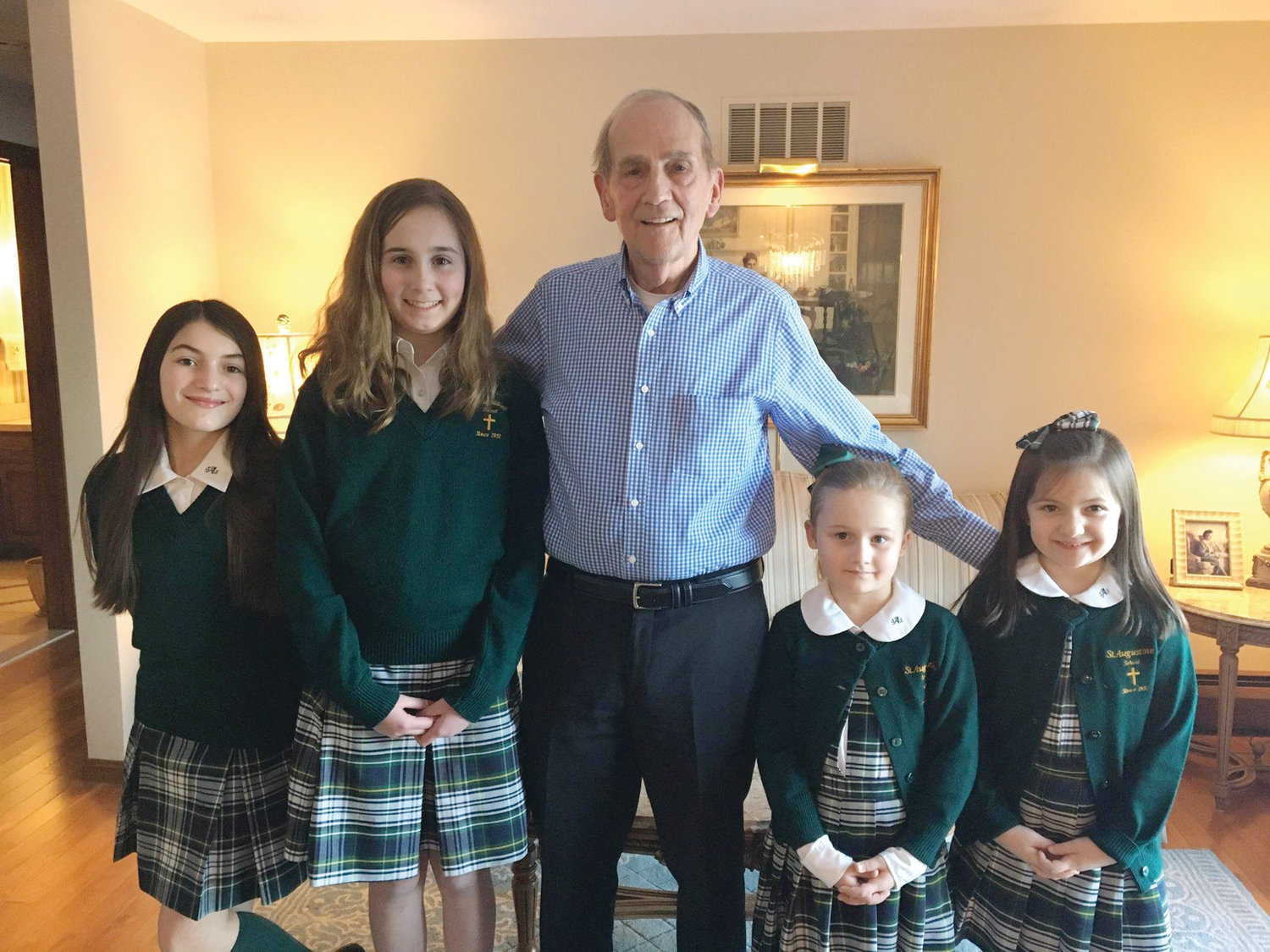 Pictured, from left, students Kiely DeQuattro, Elyse Brassard, Lila Schaumburg and Cambria DeQuattro with W. Albert Martin.